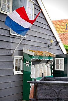 Dutch flag waving on a typical house photo