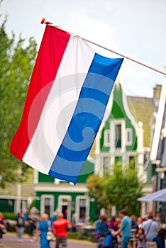 Dutch flag waving in Zaandam, land of windmills