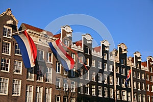 Dutch flags on canal houses.