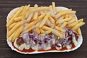 Dutch fries with meat and red onions