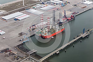 Dutch harbor Eemshaven with crane platform for installing offshore windturbines