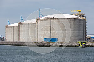 Dutch harbor Rotterdam with oil storage tanks