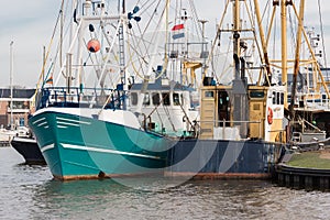Dutch harbor of Urk with fishing cutters photo