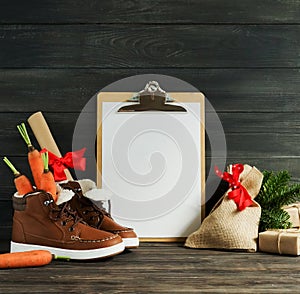 Dutch Holiday Sinterklaas background. Children`s shoes, carrots