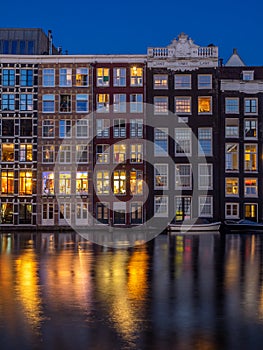 Dutch houses on the Damrak in Amsterdam