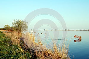 Dutch lake in the evening sun with fishing net