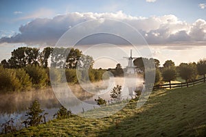 Dutch Landscape with Windmill and River