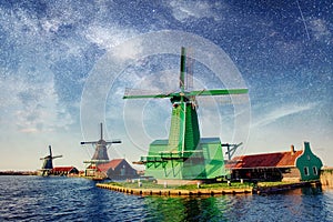 Dutch mill at night. Starry sky. Holland. Netherlands