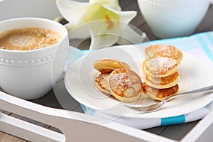 Dutch mini pancakes called poffertjes