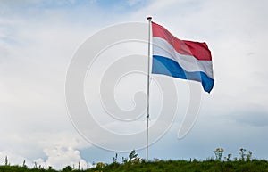 Dutch national flag waving in the wind