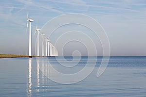 Dutch offshore wind turbines in a calm sea