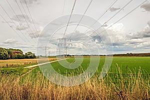 Dutch polder landscape with high voltages lines