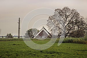 Dutch polder landscape house below sea level