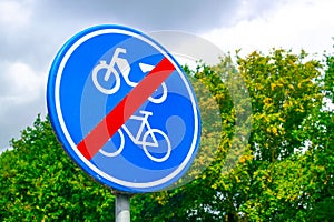 Dutch road sign end of moped and bike path