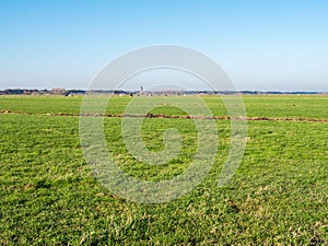 Dutch rural landscape of farmland and meadows in polder Eempolder near Eemnes, Netherlands