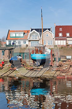 Dutch shipyard of Urk with historic fishing ships photo