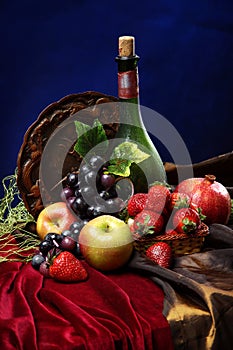 Dutch still life on a velvet tablecloth of juicy fruits and a dusty old bottle of wine, vertical