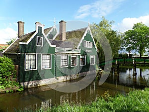 Dutch Style Green and White Colored Wooden House