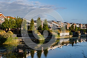 Dutch Suburban area with modern family houses, newly build modern family homes in the Netherlands, dutch family house