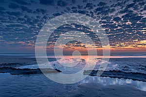 Dutch sunset at sea with clouds