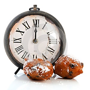 Dutch traditional oliebollen and clock