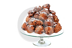 Dutch traditional oliebollen on glass-plate