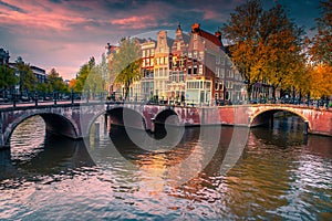 Dutch water canals and great cityscape at sunset, Amsterdam, Netherlands