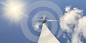 Dutch wind turbine with blue sky and sunlight
