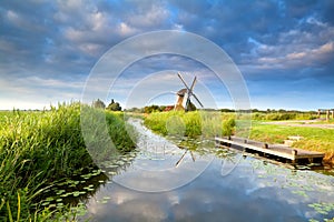 Dutch windmill and blue morning sky