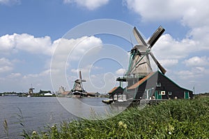 Dutch windmill on a canals edge