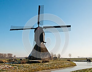 Dutch windmill and a frozen ditch