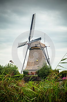 Dutch Windmill and landscape seen from Kinderdijk Netherlands