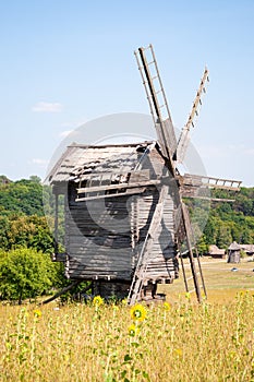 Dutch windmill. Landscape with traditional Ukrainian windmills houses in countryside village. Windmill mill at rural outdoor. Wind