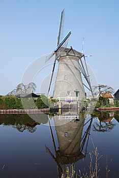 Dutch windmill reflected water