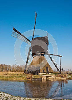 Dutch windmill with scoopwheel pump