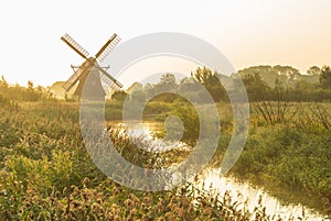 Dutch windmill at sunrise