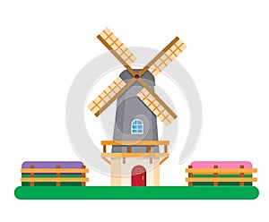 Dutch windmill between tulip fields, Holland traditional builiding for agricultural symbol in flat illustration editable vector photo