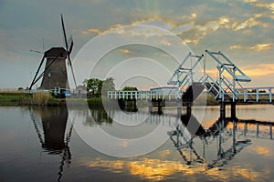 Dutch windmills with canal reflections at Kinderdijk, Netherlands