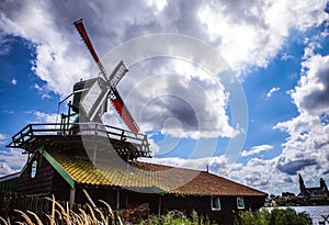 Dutch windmills with dramatic cloudy sky