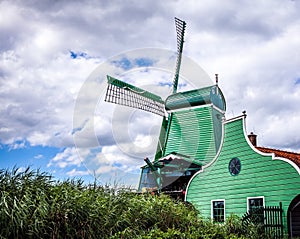Dutch windmills with dramatic cloudy sky