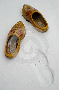 Dutch wooden shoes in the snow