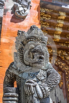 Dvarapala Guardian, Carved stone sculpture at Pura Tirta Empul temple.