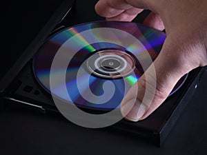 DVD Loading into a Disc Player by Hand