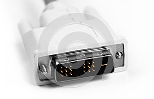 DVI plug, white cable closeup on white background, macro