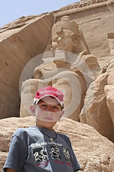 Dwarfed by the statue