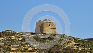 DWEJRA, GOZO, MALTA - Oct 11, 2014: Dwejra Tower, overlooking Dwejra Bay and cliffs in Gozo, where the Dothraki wedding took place