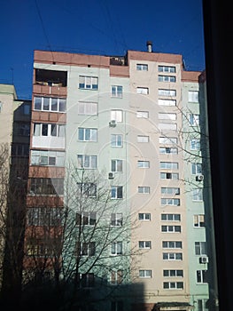 Dwelling house against the background of dark blue sky