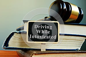 DWI driving while intoxicated law and book photo