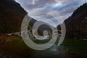 Dyavolski most in Bulgaria landscape. Bridge over the Arda River in a narrow gorge. Near the Bulgarian town of Ardino in the