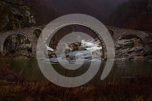 Dyavolski most in Bulgaria landscape. Bridge over the Arda River in a narrow gorge. Near the Bulgarian town of Ardino in the